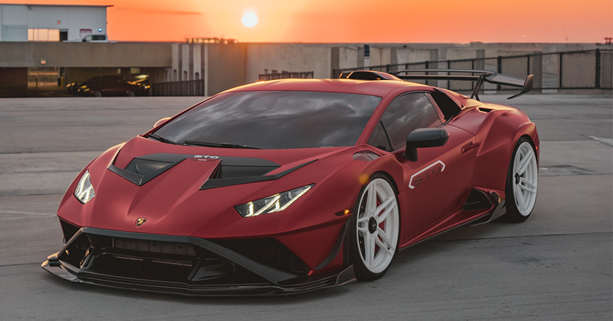 Custom red Lamborghini car wrap in Orlando, FL by Ultimate Wraps FL
